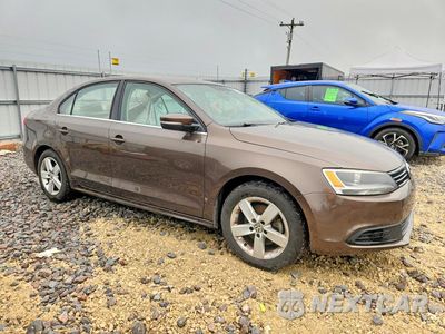 Czwarte zdjęcie samochodu z boku: 2014 VOLKSWAGEN JETTA TDI VIN:3VW3L7AJ9EM416196 - miniatura