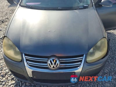 Zdjęcie 11 z 13 samochodu: 2005 VOLKSWAGEN NEW JETTA VALUE VIN:3VWPF71K35M631042 - miniatura