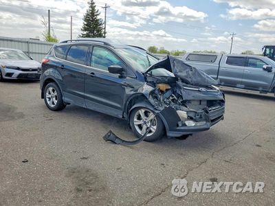Czwarte zdjęcie samochodu z boku: 2014 FORD ESCAPE SE VIN:1FMCU0G99EUB13138 - miniatura