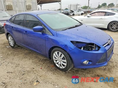 Czwarte zdjęcie samochodu z boku: 2012 FORD FOCUS SE VIN:1FAHP3F20CL455920 - miniatura