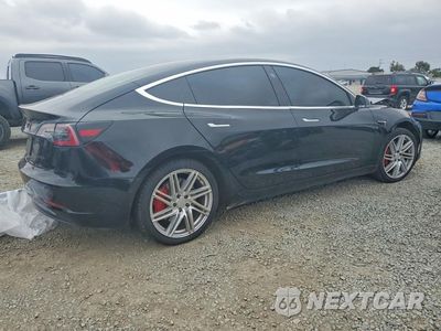 Trzecie zdjęcie samochodu z tyłu: 2018 TESLA MODEL 3 VIN:5YJ3E1EBXJF187670 - miniatura