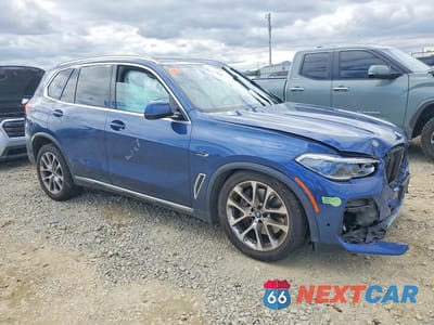 Czwarte zdjęcie samochodu z boku: 2023 BMW X5 XDRIVE45E VIN:5UXTA6C06P9P86934 - miniatura