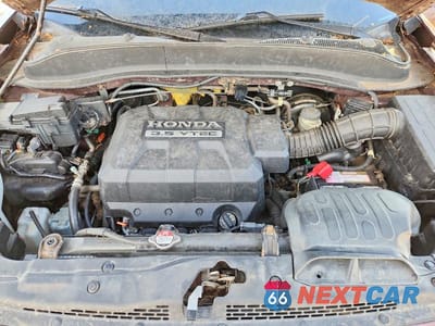 Zdjęcie 11 z 12 samochodu: 2008 HONDA RIDGELINE RT VIN:2HJYK16218H502899 - miniatura