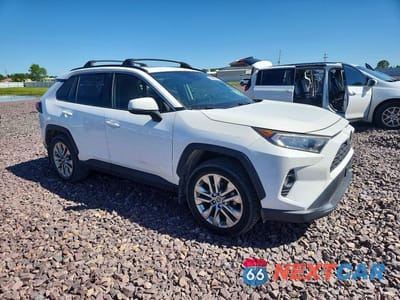 Czwarte zdjęcie samochodu z boku: 2019 TOYOTA RAV4 XLE PREMIUM VIN:JTMC1RFV1KD019945 - miniatura