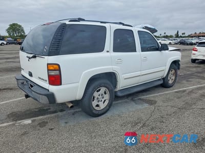 Trzecie zdjęcie samochodu z tyłu: 2004 CHEVROLET TAHOE C1500 VIN:1GNEC13T24J326219 - miniatura