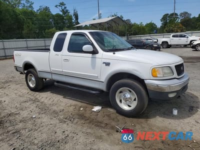 Czwarte zdjęcie samochodu z boku: 2000 FORD F150 VIN:1FTRX18L3YNA38893 - miniatura