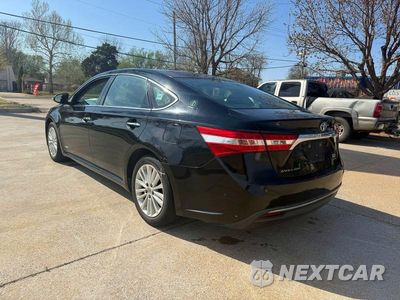 Trzecie zdjęcie samochodu z tyłu: 2014 TOYOTA AVALON HYBRID XLE PREMIUM VIN:4T1BD1EB7EU021808 - miniatura