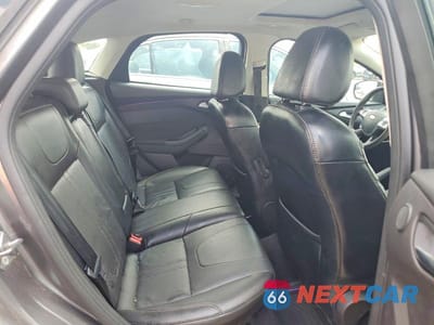 Zdjęcie 10 z 12 samochodu: 2014 FORD FOCUS TITANIUM VIN:1FADP3N29EL416455 - miniatura