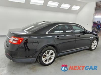 Trzecie zdjęcie samochodu z tyłu: 2017 FORD TAURUS SEL VIN:1FAHP2H82HG126292 - miniatura