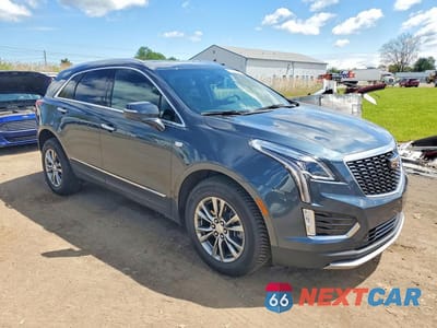 Czwarte zdjęcie samochodu z boku: 2021 CADILLAC XT5 PREMIUM LUXURY VIN:1GYKNDRS9MZ165594 - miniatura