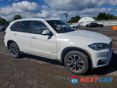 Czwarte zdjęcie samochodu z boku: 2016 BMW X5 XDR40E VIN:5UXKT0C57G0S77051 - miniatura