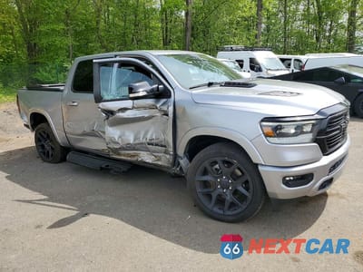 Czwarte zdjęcie samochodu z boku: 2022 RAM 1500 LARAMIE VIN:1C6SRFJT5NN267355 - miniatura