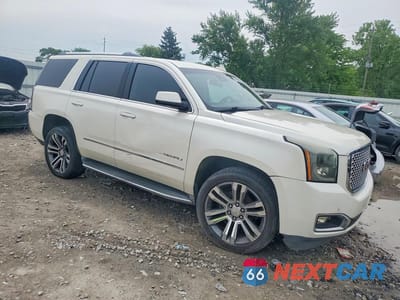 Czwarte zdjęcie samochodu z boku: 2015 GMC YUKON DENALI VIN:1GKS1CKJ1FR641390 - miniatura