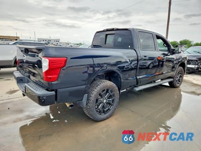 Trzecie zdjęcie samochodu z tyłu: 2018 NISSAN TITAN XD SL VIN:1N6BA1F48JN520146 - miniatura