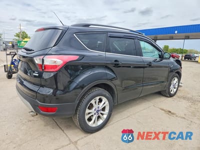 Trzecie zdjęcie samochodu z tyłu: 2017 FORD ESCAPE SE VIN:1FMCU0GD5HUE22503 - miniatura