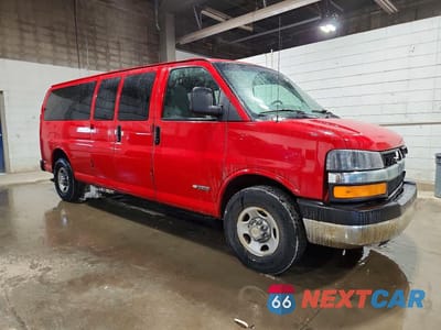 Czwarte zdjęcie samochodu z boku: 2003 CHEV EXPRESS G3500 VIN:1GAHG39U531131664 - miniatura