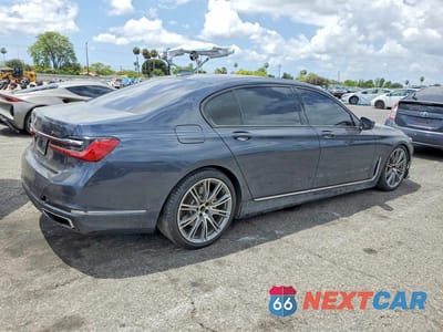 Trzecie zdjęcie samochodu z tyłu: 2020 BMW 740 I VIN:WBA7T2C05LGL17035 - miniatura