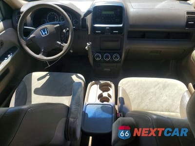 Zdjęcie 8 z 13 samochodu: 2004 HONDA CR-V EX VIN:SHSRD788X4U213083 - miniatura
