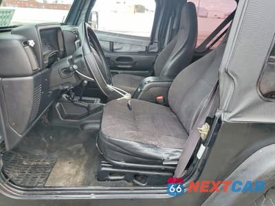 Zdjęcie 7 z 12 samochodu: 2002 JEEP WRANGLER / TJ SPORT VIN:1J4FA49S62P719289 - miniatura