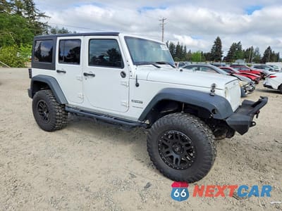 Czwarte zdjęcie samochodu z boku: 2014 JEEP WRANGLER UNLIMITED SPORT VIN:1C4BJWDG5EL145797 - miniatura