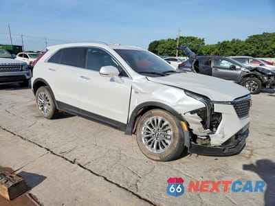 Czwarte zdjęcie samochodu z boku: 2024 CADILLAC XT4 PREMIUM LUXURY VIN:1GYFZCR43RF197581 - miniatura