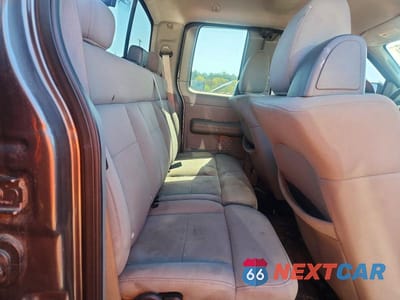 Zdjęcie 10 z 12 samochodu: 2006 FORD F150 VIN:1FTRX14W06FA29060 - miniatura