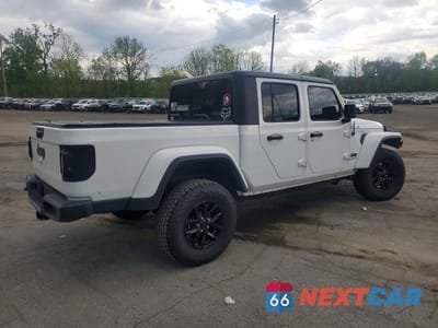 Trzecie zdjęcie samochodu z tyłu: 2023 JEEP GLADIATOR SPORT VIN:1C6JJTAG0PL585709 - miniatura