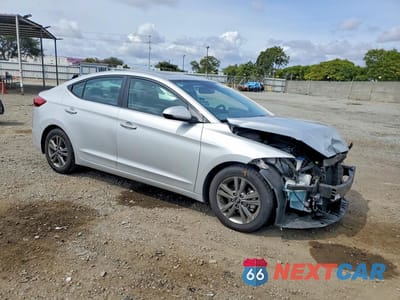 Czwarte zdjęcie samochodu z boku: 2018 HYUNDAI ELANTRA VALUE EDITION VIN:5NPD84LF8JH259678 - miniatura