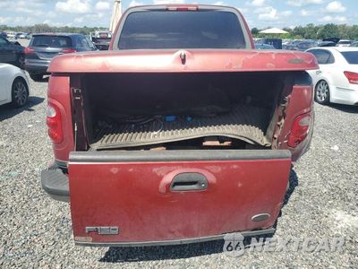 Zdjęcie 21 z 52 samochodu: 2003 FORD F150 SUPERCREW VIN:1FTRW07643KD57397 - miniatura