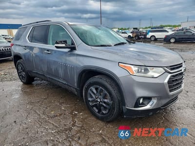 Czwarte zdjęcie samochodu z boku: 2019 CHEVROLET TRAVERSE LT VIN:1GNERGKW7KJ156689 - miniatura