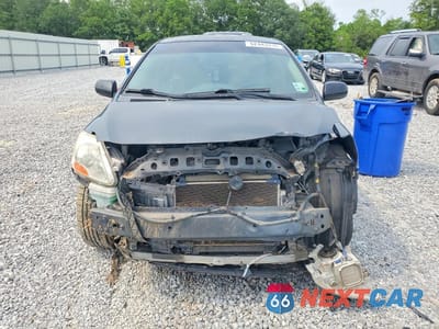 Piąte zdjęcie samochodu w środku: 2007 TOYOTA YARIS BASE VIN:JTDBT923571048450 - miniatura