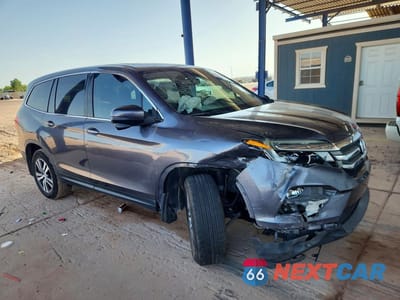 Czwarte zdjęcie samochodu z boku: 2017 HONDA PILOT EXL VIN:5FNYF5H51HB031026 - miniatura