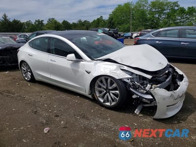 Czwarte zdjęcie samochodu z boku: 2020 TESLA MODEL 3 VIN:5YJ3E1EA5LF614263 - miniatura