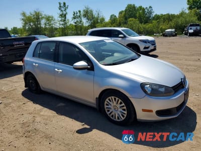 Czwarte zdjęcie samochodu z boku: 2014 VOLKSWAGEN GOLF VIN:WVWDB7AJ5EW011818 - miniatura