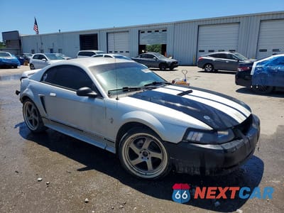 Czwarte zdjęcie samochodu z boku: 2000 FORD MUSTANG VIN:1FAFP4049YF141146 - miniatura