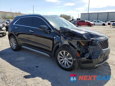 Czwarte zdjęcie samochodu z boku: 2019 CADILLAC XT4 PREMIUM LUXURY VIN:1GYFZCR40KF155696 - miniatura