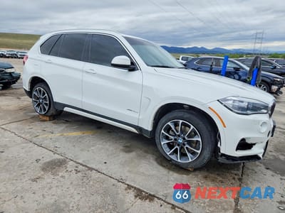 Czwarte zdjęcie samochodu z boku: 2014 BMW X5 XDRIVE35D VIN:5UXKS4C52E0J96269 - miniatura
