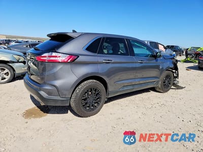 Trzecie zdjęcie samochodu z tyłu: 2022 FORD EDGE TITANIUM VIN:2FMPK4K96NBB03629 - miniatura