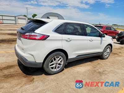 Trzecie zdjęcie samochodu z tyłu: 2023 FORD EDGE SEL VIN:2FMPK4J9XPBA11783 - miniatura