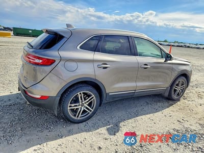 Trzecie zdjęcie samochodu z tyłu: 2016 LINCOLN MKC RESERVE VIN:5LMTJ3DH4GUJ08595 - miniatura
