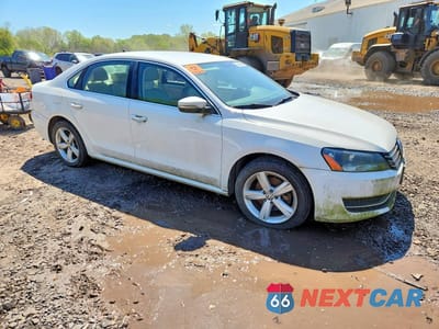 Czwarte zdjęcie samochodu z boku: 2013 VOLKSWAGEN PASSAT SE VIN:1VWBP7A31DC043804 - miniatura