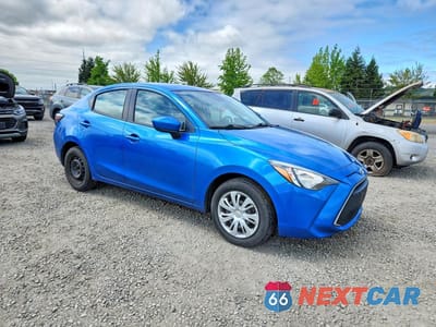 Czwarte zdjęcie samochodu z boku: 2019 TOYOTA YARIS L VIN:3MYDLBYV5KY506650 - miniatura