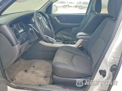 Zdjęcie 7 z 13 samochodu: 2003 MAZDA TRIBUTE VIN:4F2YZ04105KM08618 - miniatura