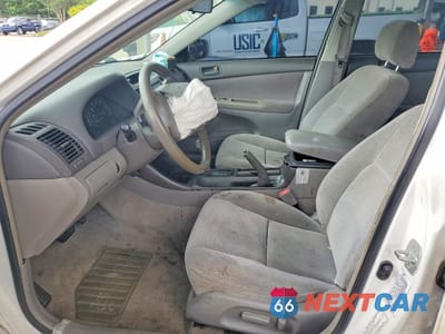 Zdjęcie 7 z 12 samochodu: 2003 TOYOTA CAMRY LE VIN:4T1BE32K13U226566 - miniatura