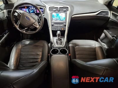 Zdjęcie 8 z 12 samochodu: 2013 FORD FUSION SE HYBRID VIN:3FA6P0LU2DR227271 - miniatura