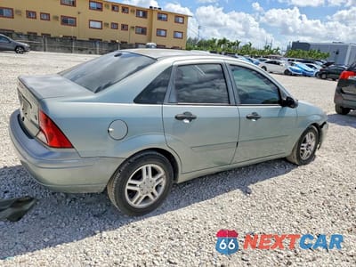 Trzecie zdjęcie samochodu z tyłu: 2003 FORD FOCUS SE VIN:1FAFP34P23W227986 - miniatura