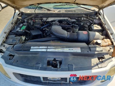 Zdjęcie 11 z 12 samochodu: 1997 FORD F150 VIN:1FTEX18L4VKC70348 - miniatura