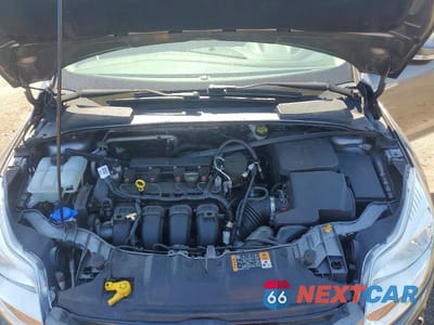 Zdjęcie 11 z 12 samochodu: 2014 FORD FOCUS TITANIUM VIN:1FADP3N29EL416455 - miniatura