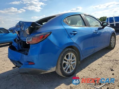 Trzecie zdjęcie samochodu z tyłu: 2016 SCION IA BASE VIN:3MYDLBZV0GY125519 - miniatura