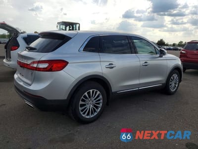 Trzecie zdjęcie samochodu z tyłu: 2016 LINCOLN MKX SELECT VIN:2LMTJ6KR2GBL79990 - miniatura